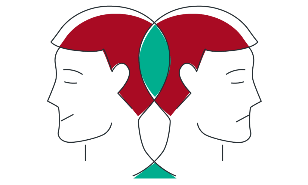 La tête d'un homme et d'une femme aux cheveux rouges et verts.