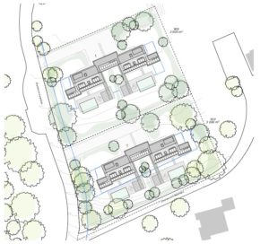 Plan du site architectural montrant deux bâtiments symétriques entourés d'arbres et de sentiers sur un terrain clos.